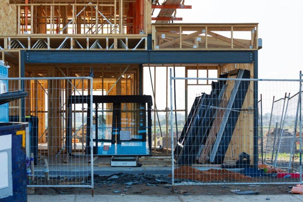 Construction skip bin hire Geelong — hook bin on a building site delivered by Geelong All Bins